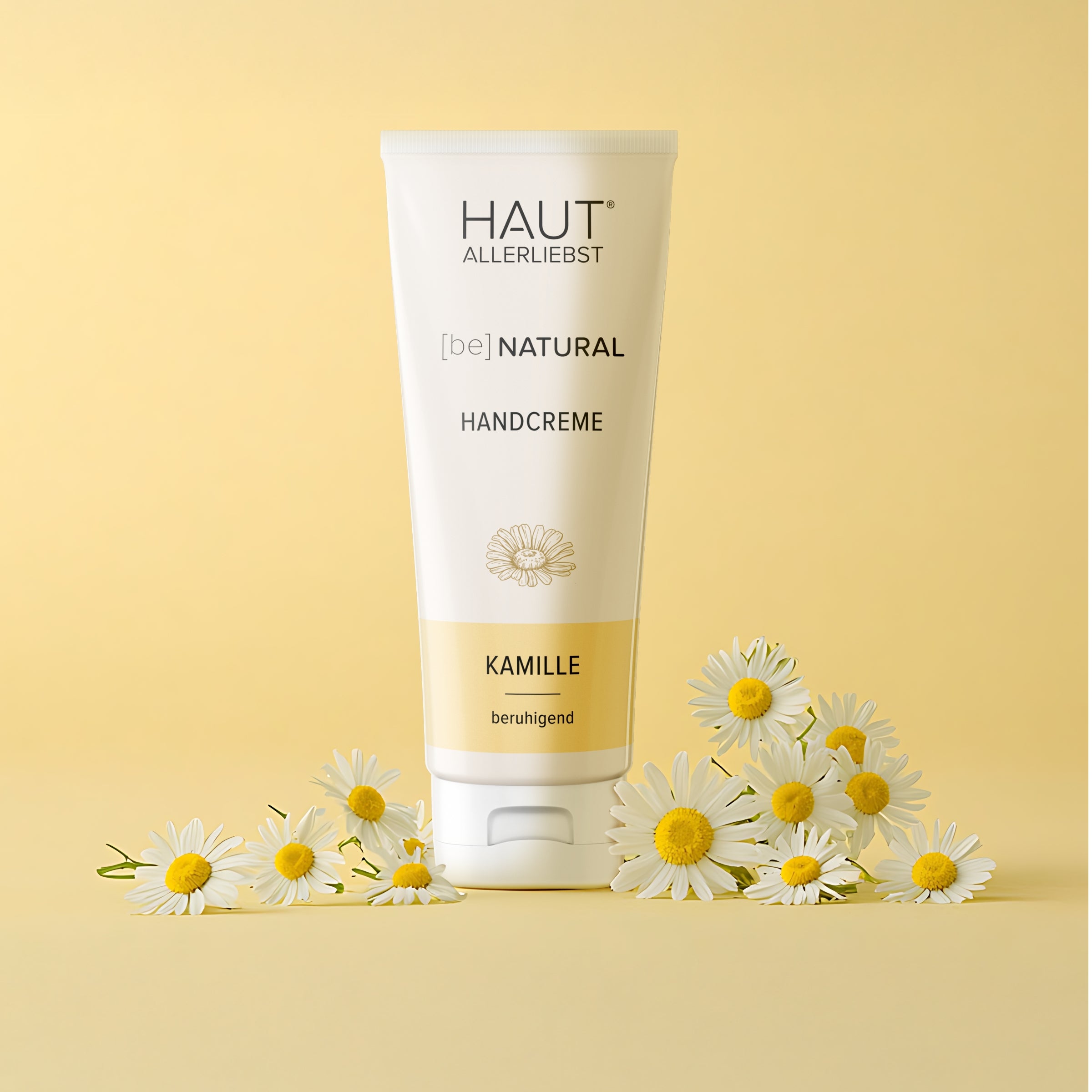 Hautallerliebst be natural Handcreme Kamille mit Kamillenblüten vor gelben Hintergrund